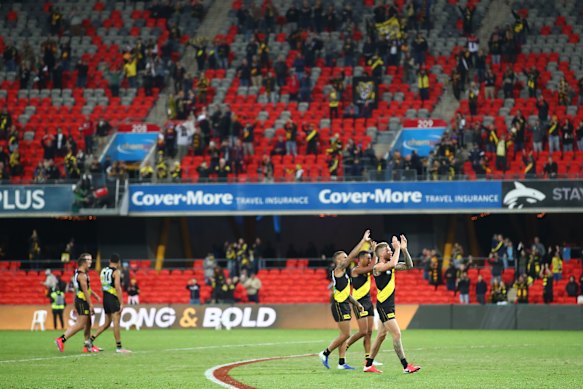 The Tigers show their appreciation at Metricon Stadium.