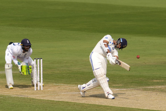 Yashasvi Jaiswal hits a six to bring up his century.