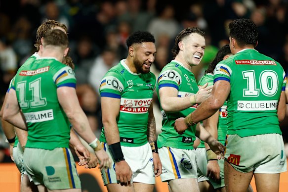 The Raiders celebrate Ethan Strange’s late try.