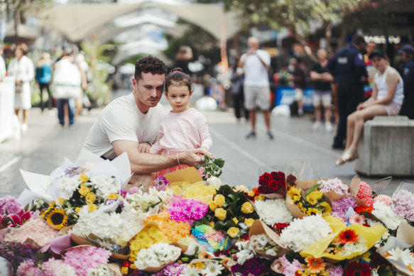 Mourners pay tribute to the victims of the Bondi Junction attack.