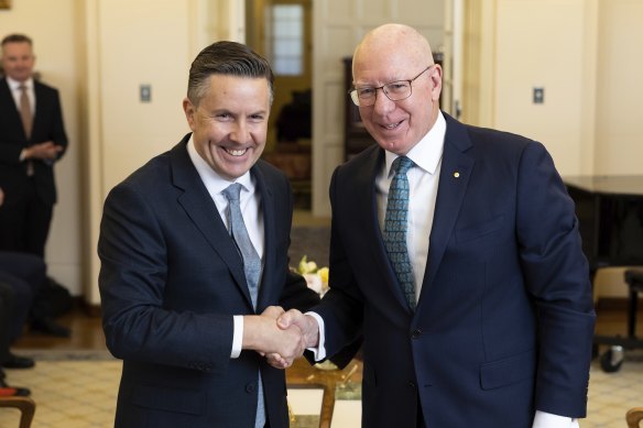 Butler, left, at his ministerial swearing-in ceremony on June 1. 