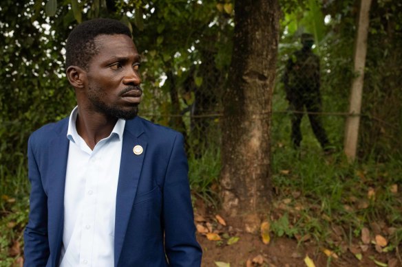 Ugandan security forces are seen outside Bobi Wine's property