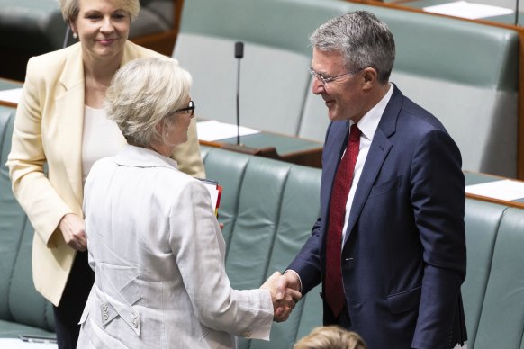 The independent member for Indi, Dr Helen Haines, shakes  hands with Attorney-General Mark Dreyfus after he introduced the National Anti-Corruption Commission Bill in the House of Representatives.