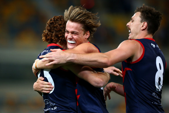 Rivers (centre) celebrates a goal kicked by good friend Oskar Baker.