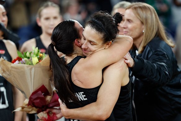 Ash Brazill embraces teammate Kelsey Browne after the game.