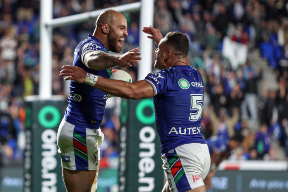 Dylan Walker celebrates after scoring the match-winning try for the Warriors.
