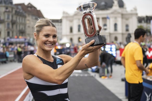 Nina Kennedy celebrates with her trophy after securing the win.