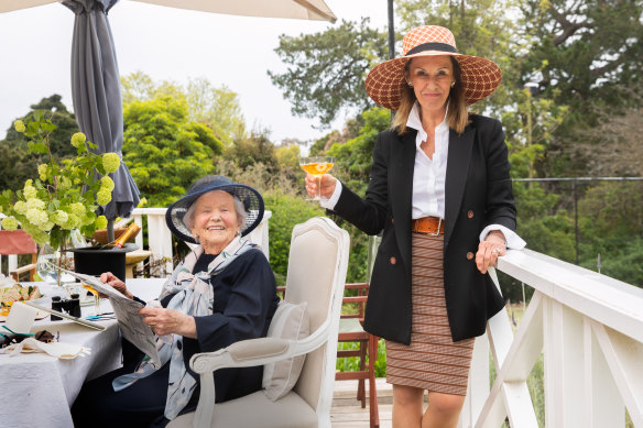 Helen Lamont, 100, plans to frock up for the Caulfield Cup and share a bottle of bubbles at home with her daughter Catriona Redd.