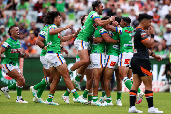The Raiders celebrate a try during Saturday’s win.
