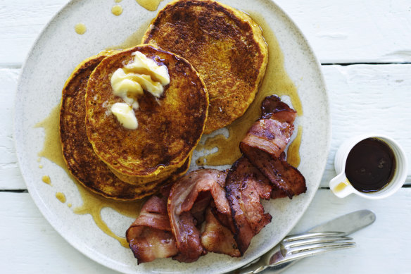 Pumpkin spice pancakes with bacon and maple syrup.