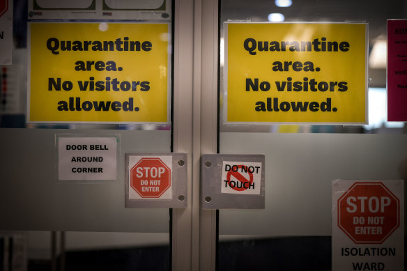 A sign outside a COVID-19 isolation ward in Melbourne in the early part of the pandemic.