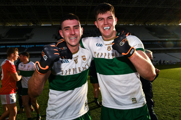 Colin O'Riordan and Steven O'Brien of Tipperary celebrate after the Munster GAA Football Senior Championship Final match between Cork and Tipperary at Páirc Uí Chaoimh in Cork.