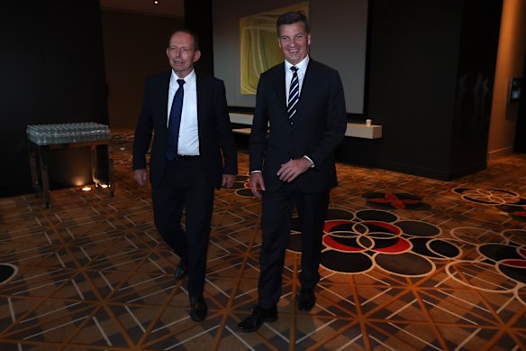 New federal president of the Liberal Party Tony Abbott (left) with Opposition Leader Angus Taylor at the party’s federal council on Saturday.