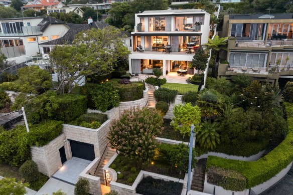 The Mosman home of David and Lerida Grant was redesigned by architect Adam Hampton complete with eight-car garage, nine bathrooms and a virtual golf range.