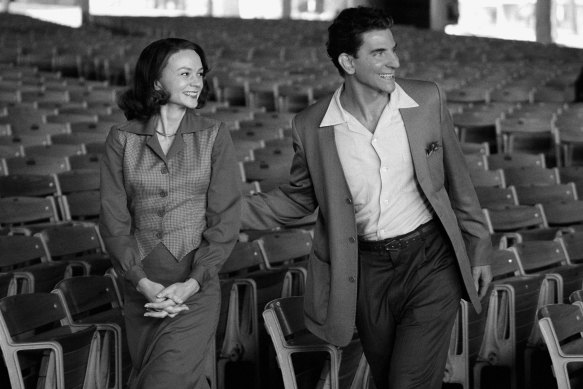 Carey Mulligan as Felicia Montealegre and Bradley Cooper as Leonard Bernstein in Maestro.