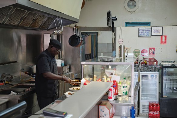 Stephen Lual at his much-loved shop Deep Blue Fish & Chips in Noble Park.