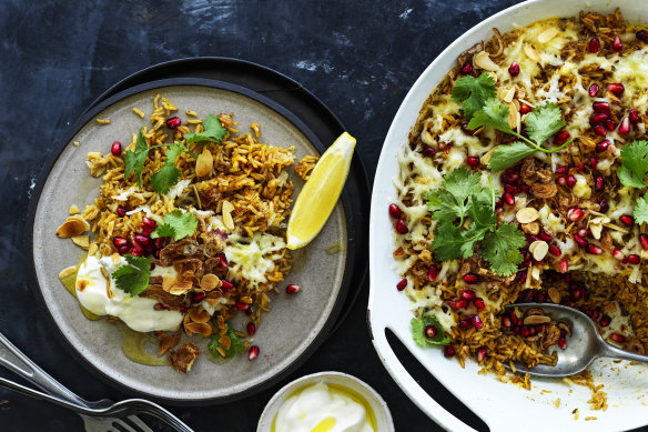 Spicy brown-butter rice with haloumi and pomegranate.