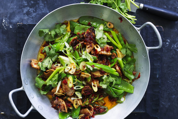 Stir-fried pork with snow peas and XO sauce.