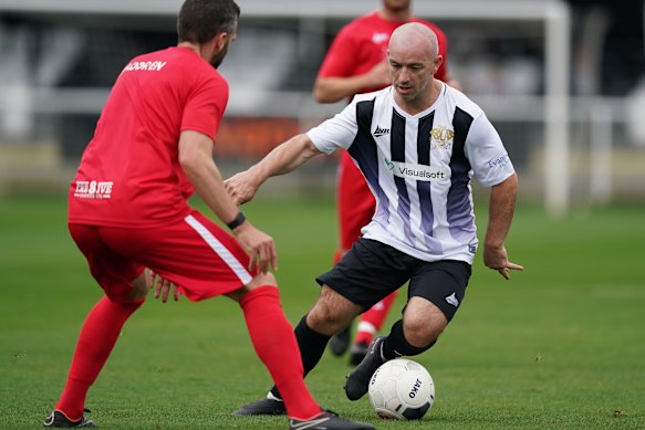 Action from a charity match at Spennymoor, in the north-east of England, which was played with new rules designed to restrict heading.