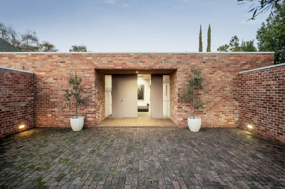 The entrance to Hallows House. designed by Guilford Bell.