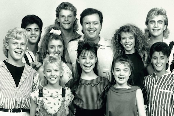 Johnny Young with performers of Young Talent Time: Greg Poynton, Rikki Arnott, Juanita Coco, Courtney Compagnino, Joey Dee. Vince Del Tito, Dannii Minogue, Natalie Miller, Mark Stevens and Beven Addinsall. 