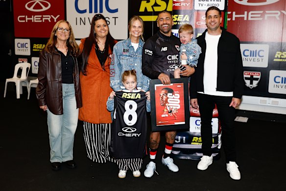 Bradley Hill (third from right) with brother Stephen and family before his 300th match.
