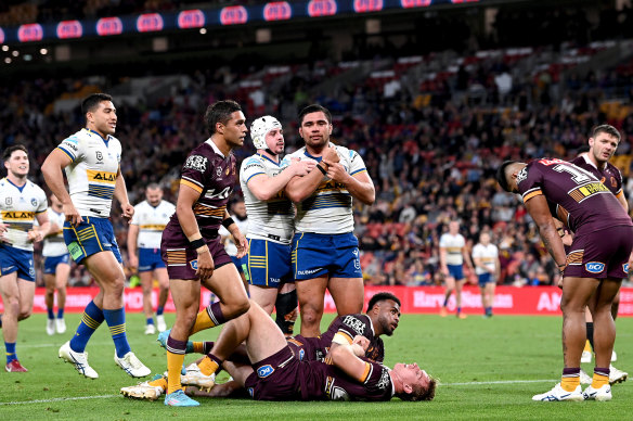 Isaiah Papali’i celebrates after scoring a late try for Parramatta.