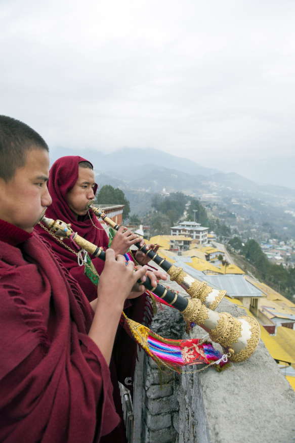 Monks blow temple horns at the Tawang monastery in the Indian state of Arunachal Pradesh. China does not recognise Indian sovereignty over much of this region.