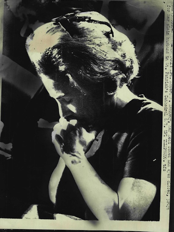 Ethel Kennedy, widow of the slain senator, kneels in prayer near the casket in St. Patrick’s Cathedral, June 7, 1968
