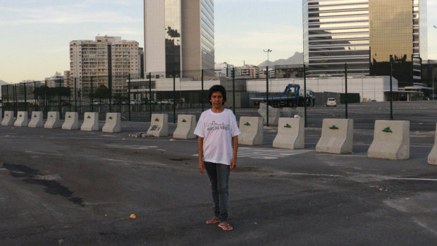 In this May photo, Maria da Penha poses on the exact spot where her house was before she was evicted to make way for Olympics construction.