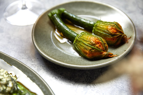 Zucchini flowers filled with scallop and ’nduja mousse.