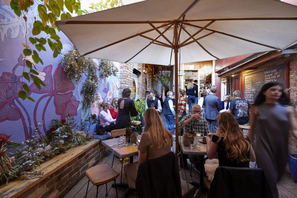Umbrellas offer shade in the courtyard. 