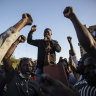 Activist Mamadou Drabo, leader of the Save Burkina Faso movement, announces to the crowd gathered Place de la Nation that Lieutenant Colonel Paul Henri Sandaogo Damiba has taken the reins of the country. 