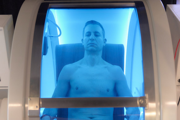 Tech entrepreneur Tristan Sternson relaxes in a hyperbaric chamber at Super Young, his life extension centre in Melbourne’s Armadale.