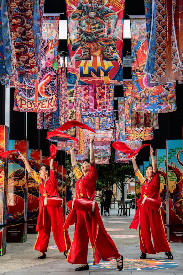 Waist drummers Anja Liu, Lucy Lee and Jane Liu in Parramatta Square.