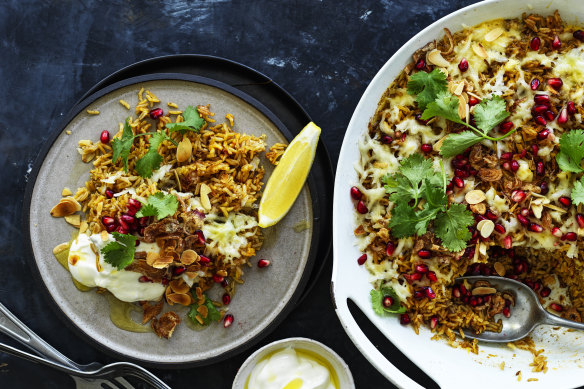 Spicy brown-butter rice with haloumi and pomegranate.