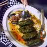 Kale rolls with spicy merguez sausage and rice.