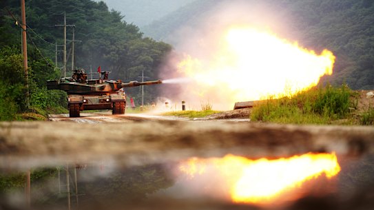 A South Korean army K1A2 tank fires during a drill as part of the annual Ulchi Freedom Shield joint military exercise in Cheorwon, South Korea, in 2023.