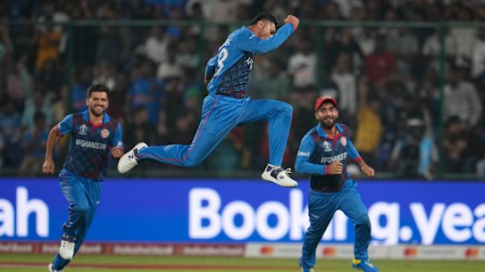 Afghanistan’s Mujeeb ur Rahman celebrates the wicket of England’s Chris Woakes.