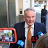 NSW MP Mark Latham leaving court.