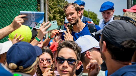 World No.2 Daniil Medvedev is mobbed by fans after training in the lead-up to the Geneva Open.