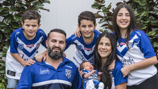 Bulldogs fan Danny Abdallah with wife Leila and children Alex, Michael, Liana and baby Selina at home on Saturday.
