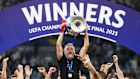 PSG’s head coach Luis Enrique celebrates with the trophy after the Champions League final soccer match between Paris Saint-Germain and Inter Milan at the Allianz Arena in Munich. 