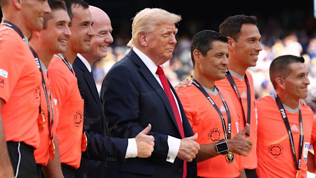 Donald Trump with FIFA president Gianni Infantino and referee Alireza Faghani (to the right of Trump).