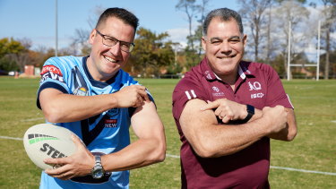 Minister for the Pacific Zed Seselja with football great Mal Meninga promoting vaccine take-up in PNG.