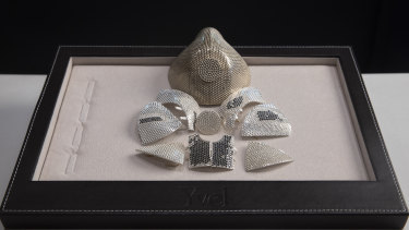 Parts and a model of the gold mask are displayed in the Israeli jewellery company Yvel in Motza near Jerusalem, Sunday, August 9, 2020. 