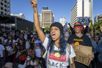 A woman at the rally in Brisbane.