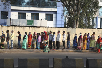 Indians queuing to be vaccinated in what is the world’s largest vaccination campaign.