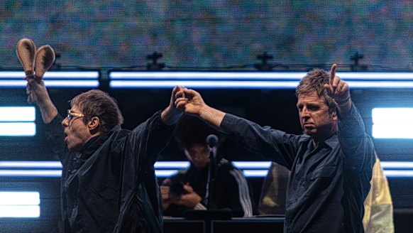 Liam and Noel Gallagher during the first Oasis show at Melbourne’s Marvel Stadium.