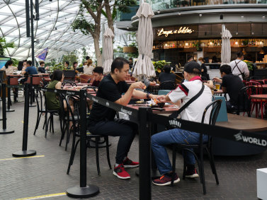 Gatherings are limited to two people under Singapore’s COVID restrictions.